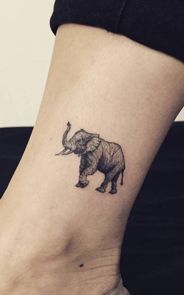 tribal elephant trunk up tattoo
