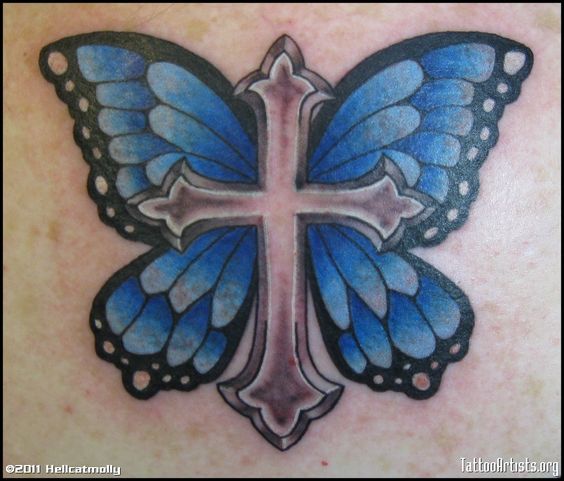 Tattoo uploaded by Alex Palleschi  Tattoo I got of a blue Monarch Butterfly  with a cross in the middle It says God has you in his arms I have you in
